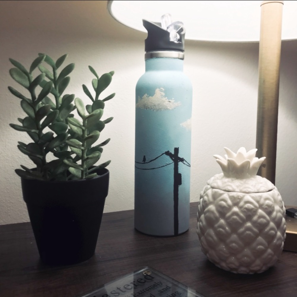 Painted Hydro Flask with a straw